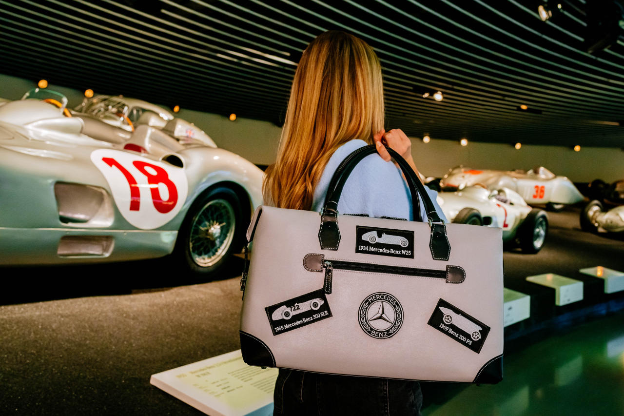 125 years of motorsports” Weekend Bag - B66058010